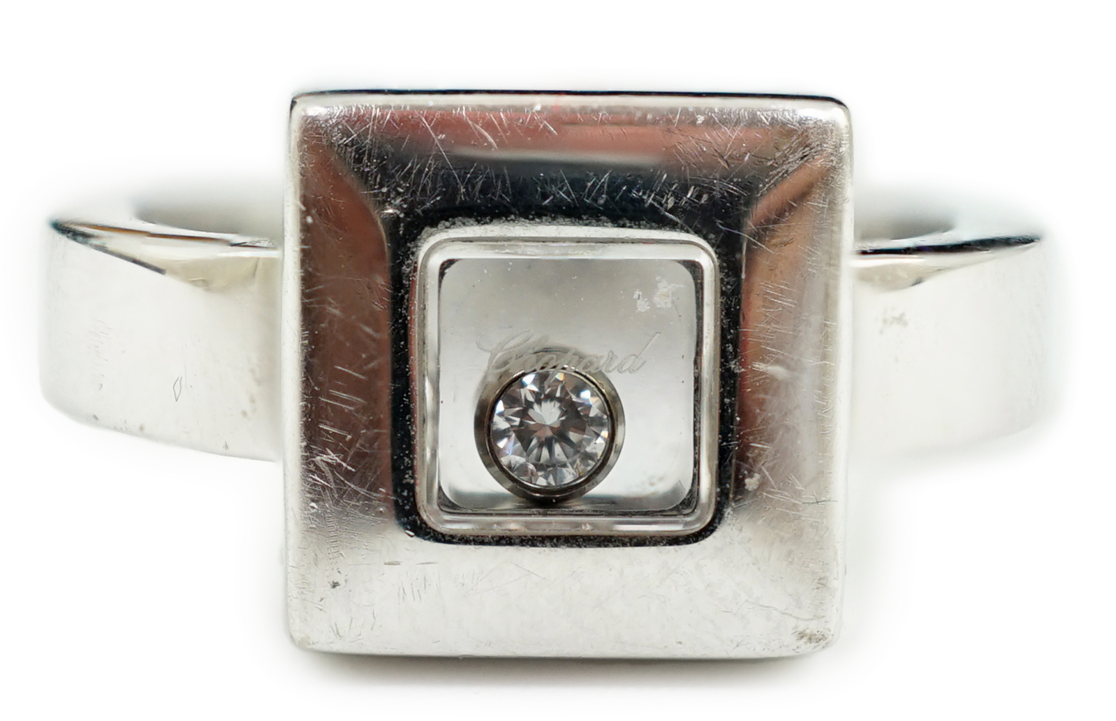 A modern Chopard 18ct white gold 'Happy Floating' diamond ring